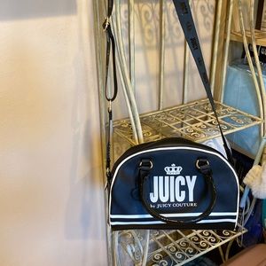 Juicy couture throw back shoulder and arm bag  black and white New no tag